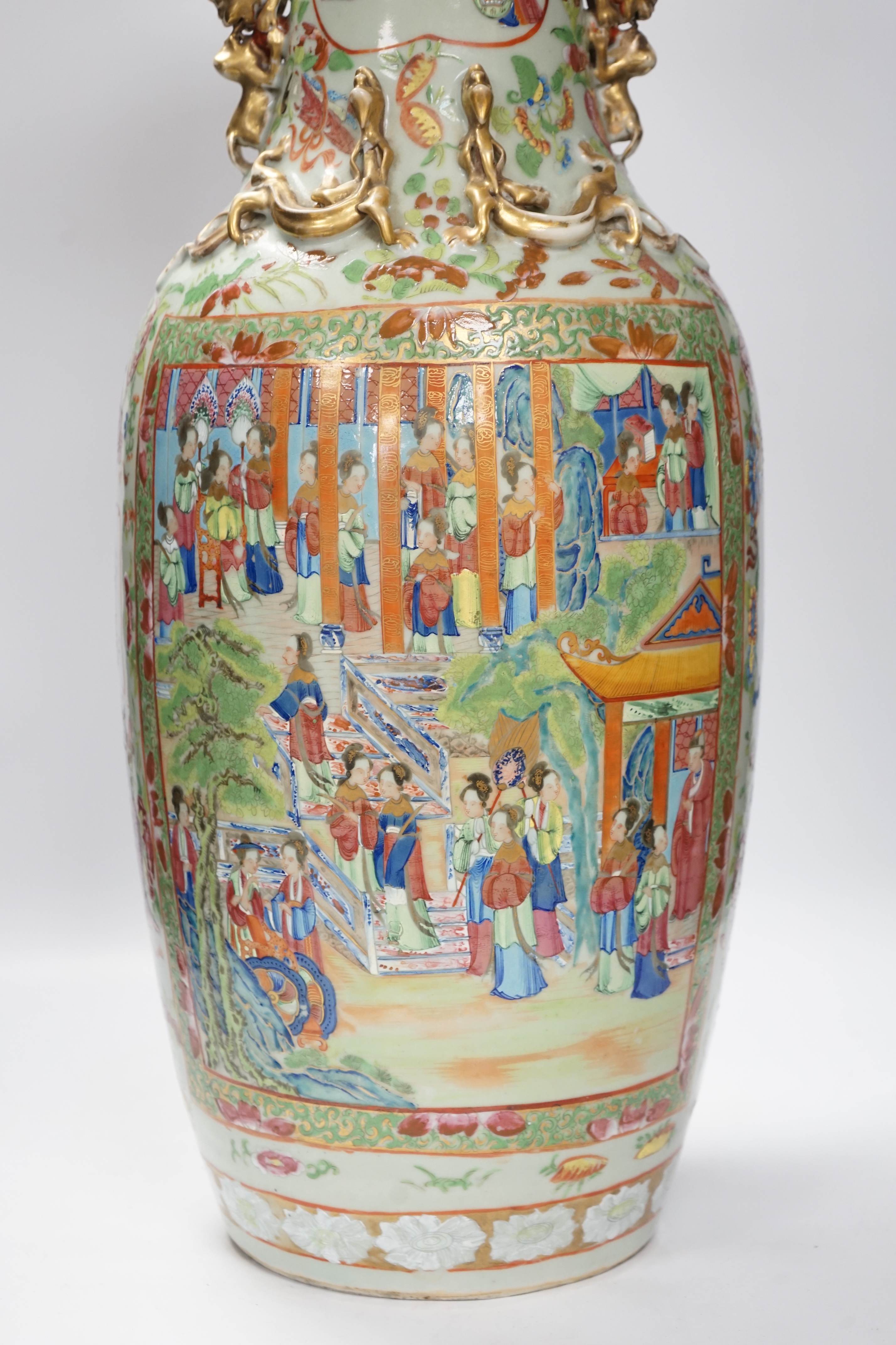 A large Chinese famille rose celadon ground vase, 19th century, 64cm high (a.f.)